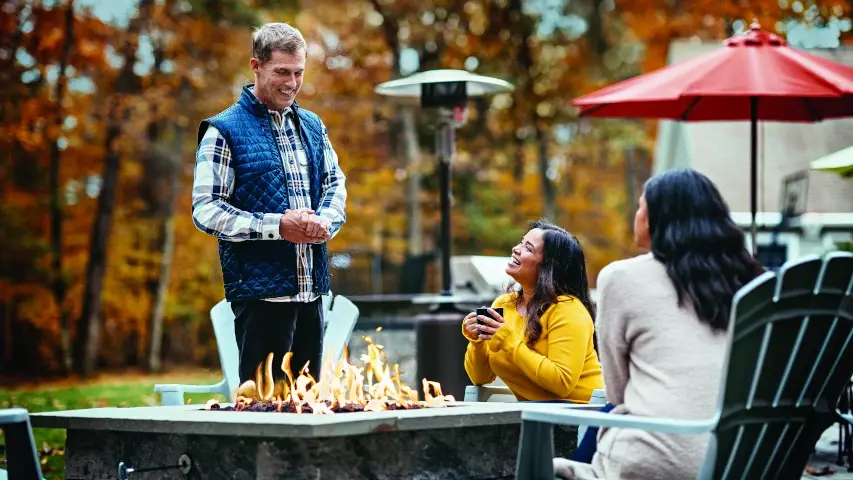 People around propane fire pit