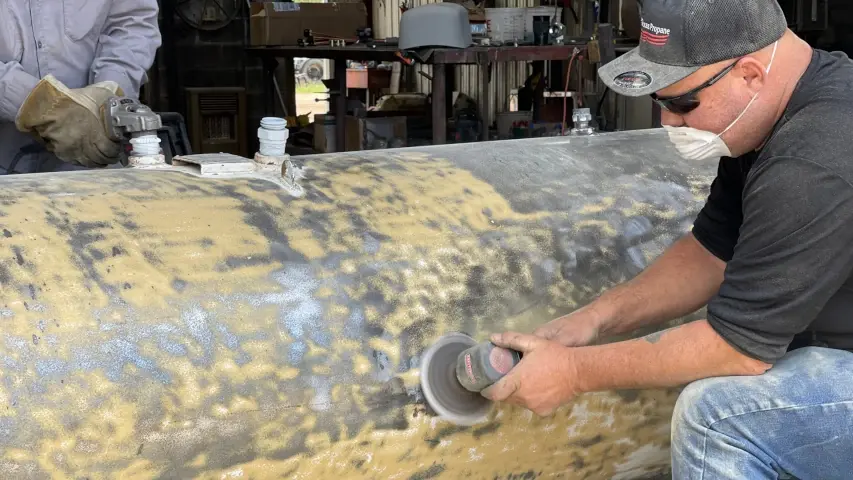 Propane tank restoration grinding
